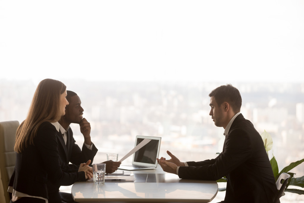 people and lawyer discussing