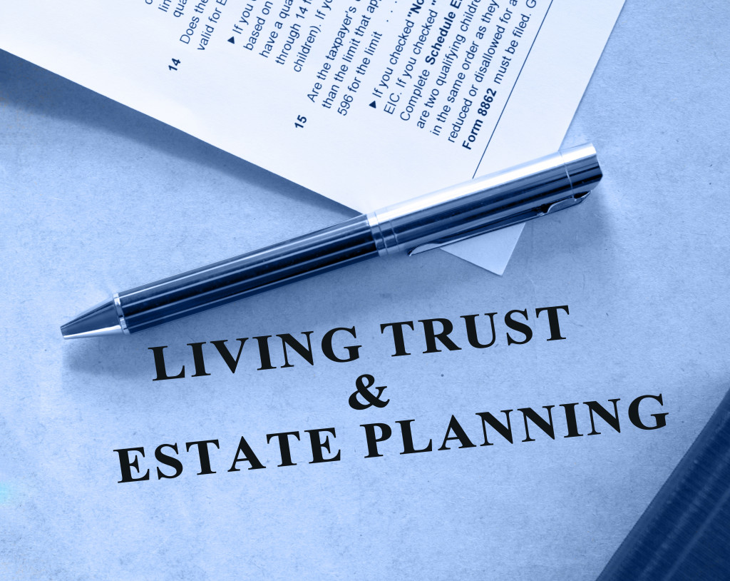 A living trust and estate planning document and a pen