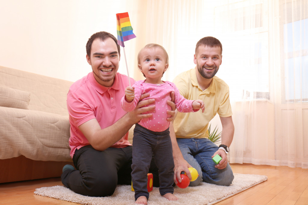 same sex couple with their kids
